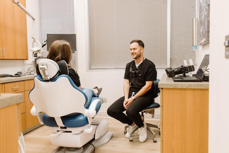 Dr. Lassiter consulting with a patient about treatment options