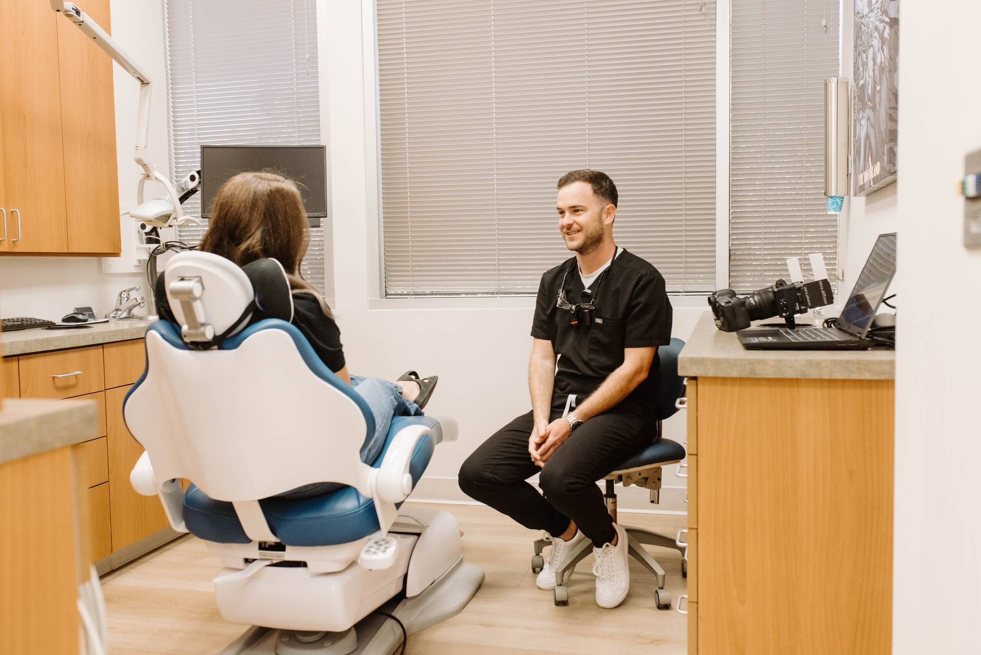 Dr. Lassiter consulting with a patient at Valley Dental Group